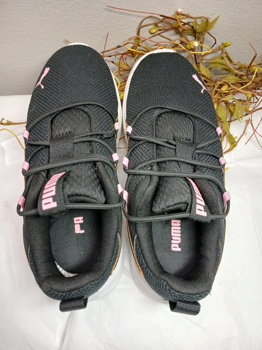Puma Black Sneakers with Pink Accents and Orange Trim